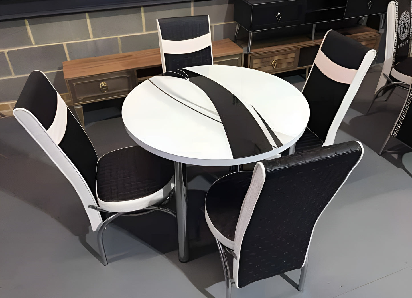 Round Glass And Steel Dining Table With 4 Faux Leather Chairs